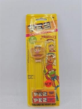 Vintage PEZ Muppets Fozzie Bear Candy Dispenser Yellow Cardstock Package